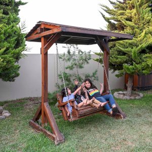 double wooden swinging bench seat with roof