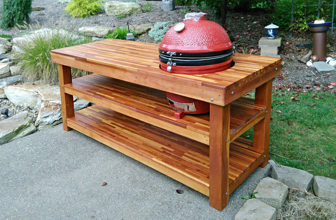 https://www.foreverredwood.com/image/catalog/product/outdoor-table-with-built-in-grill/robert_veseleny2.jpg